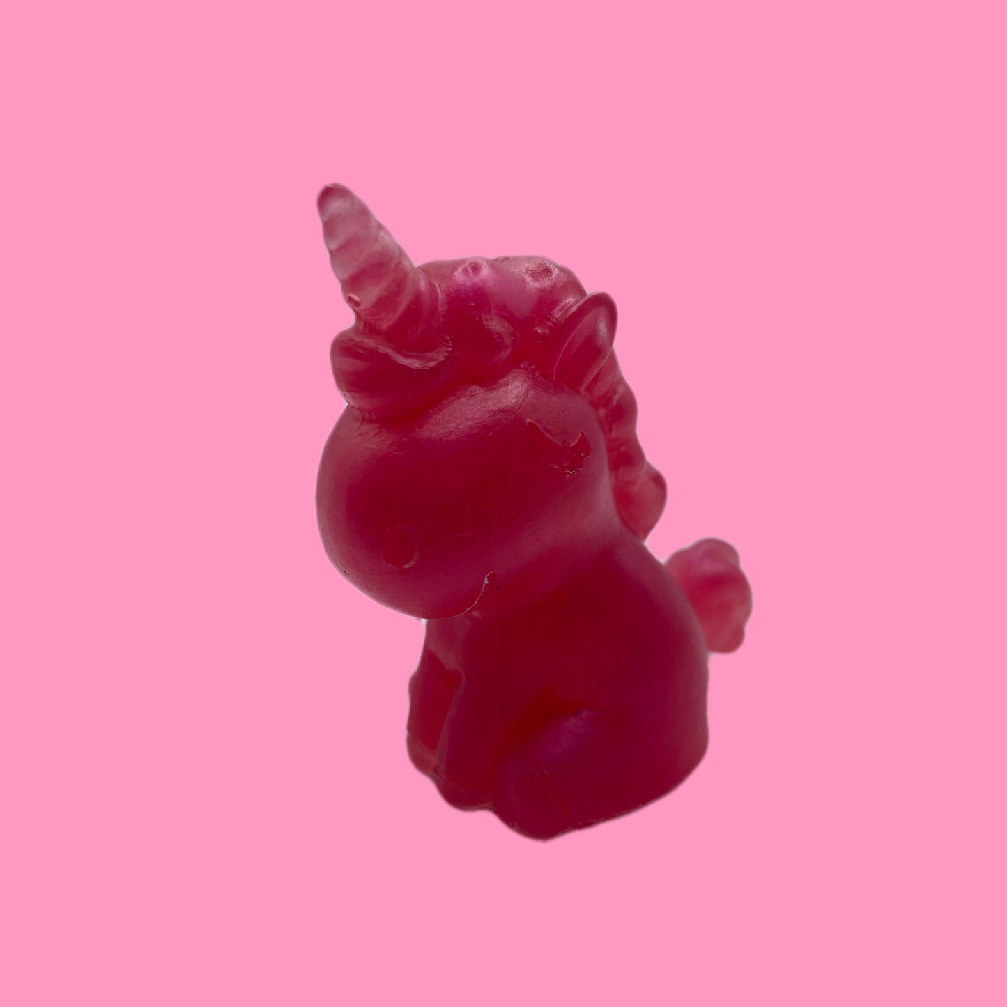 Small dark pink unicorn