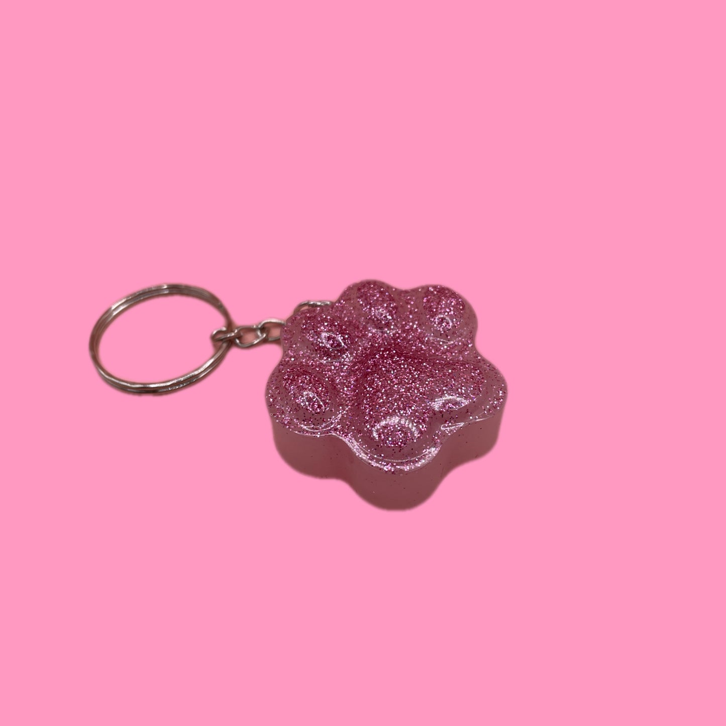 Pink glitter paw print