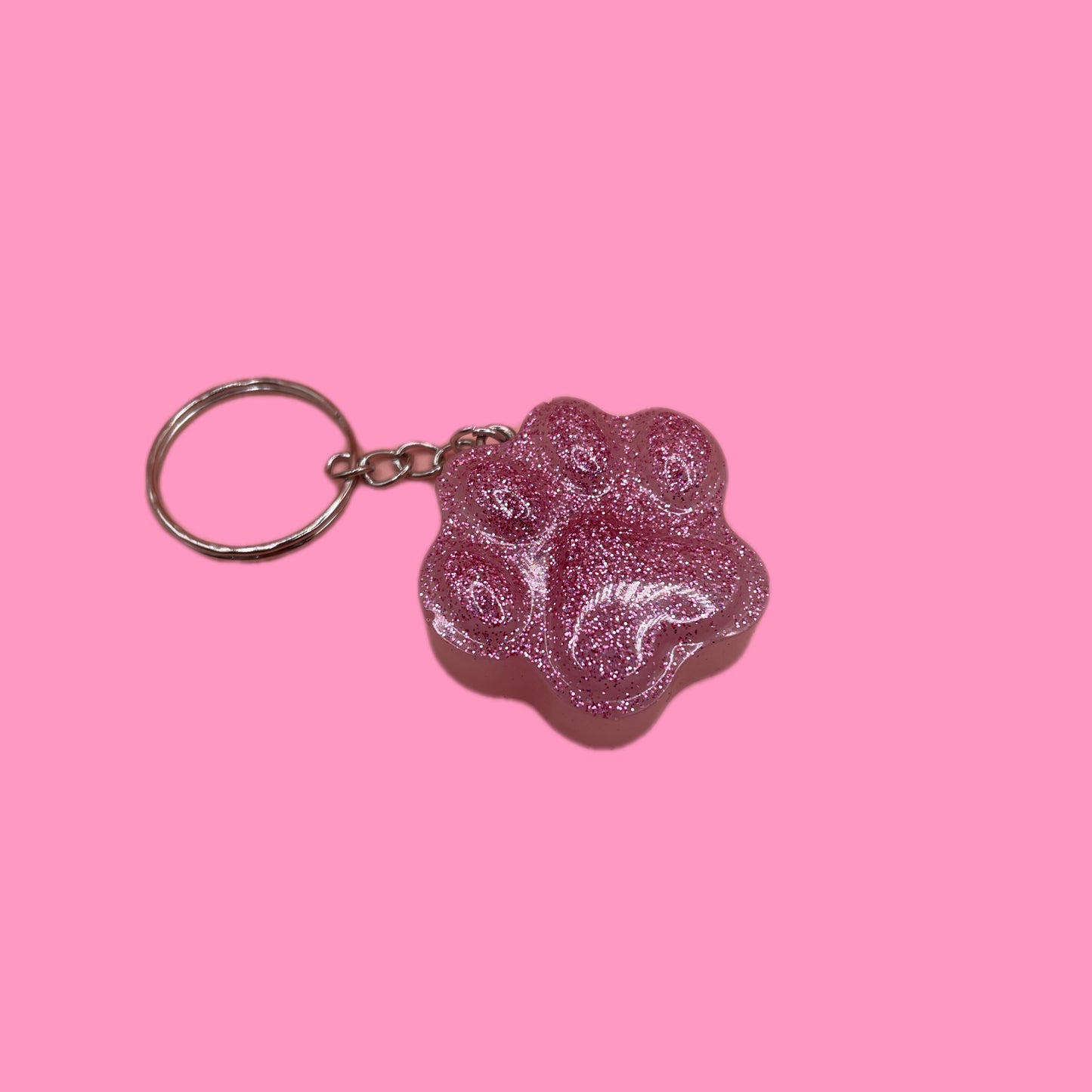 Pink glitter paw print