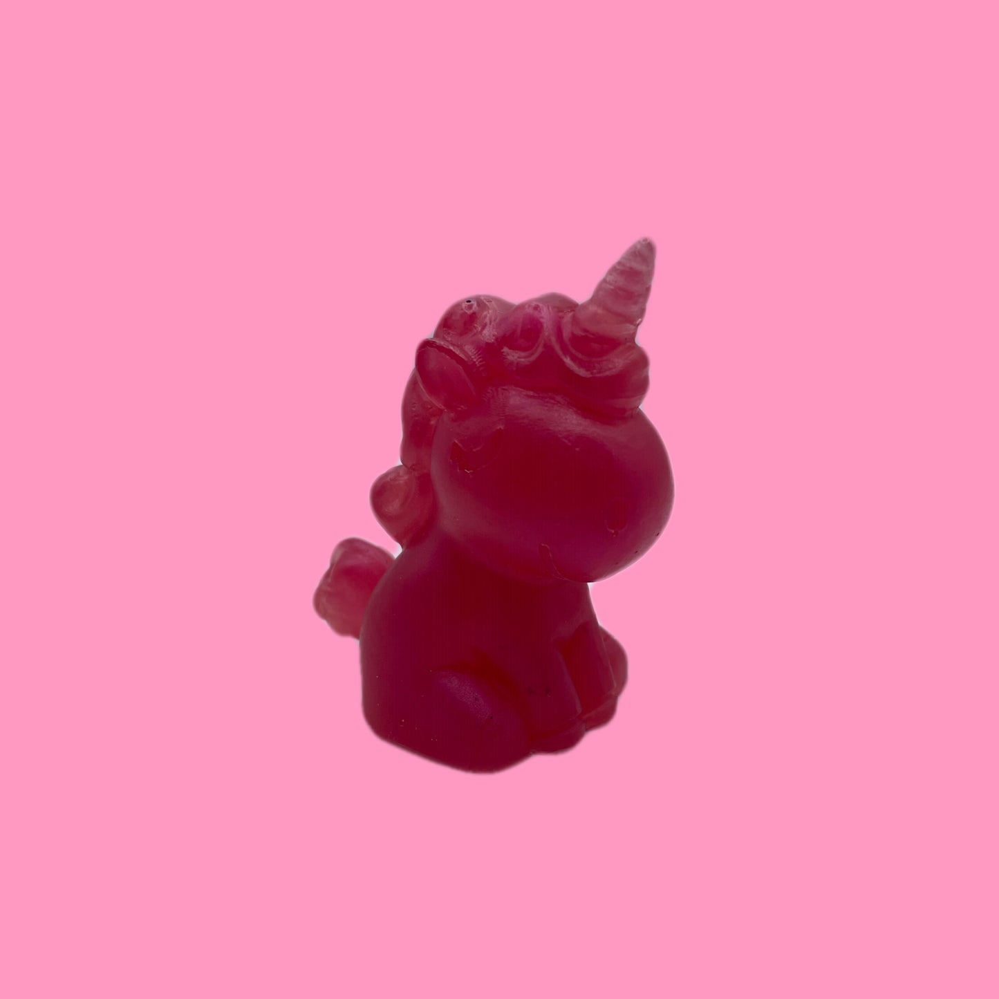 Small dark pink unicorn