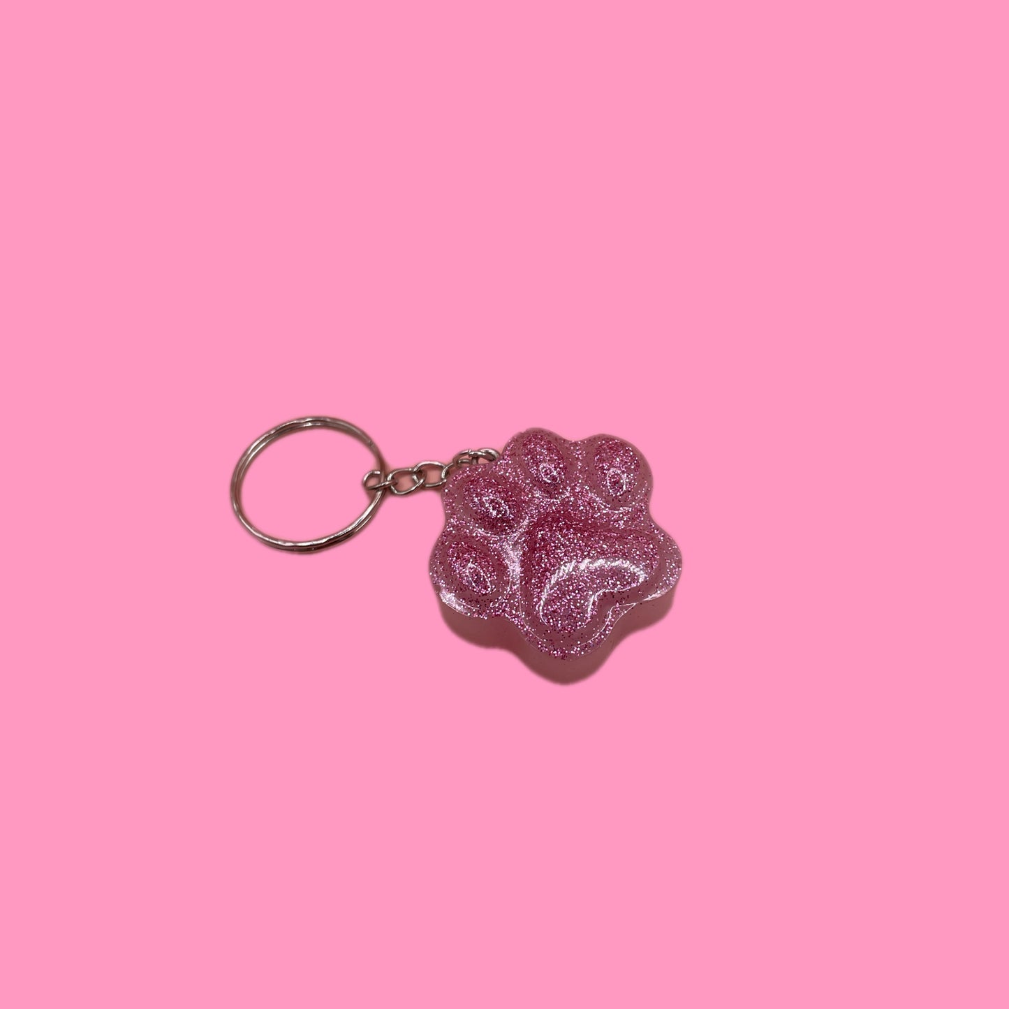 Pink glitter paw print