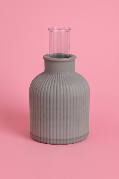 Silicone mold for a thin, ribbed vase.