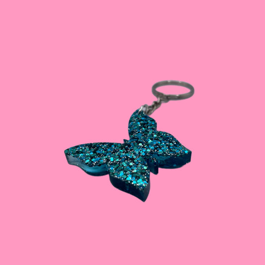 Porte-clé papillon bleu paillettes